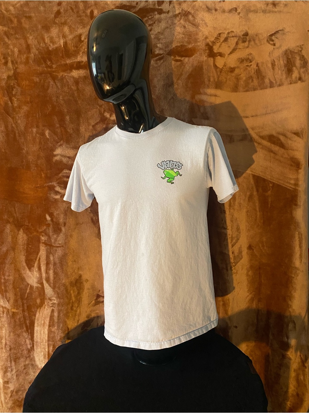 Unisex Light Blue Graphic Tee with Green Frog Logo